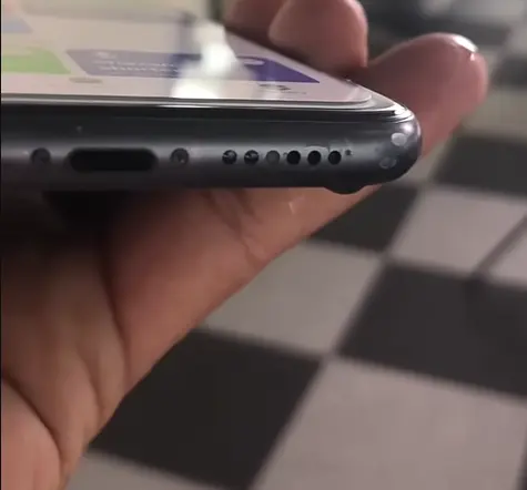 A phone placed in rice as a water damage drying method
